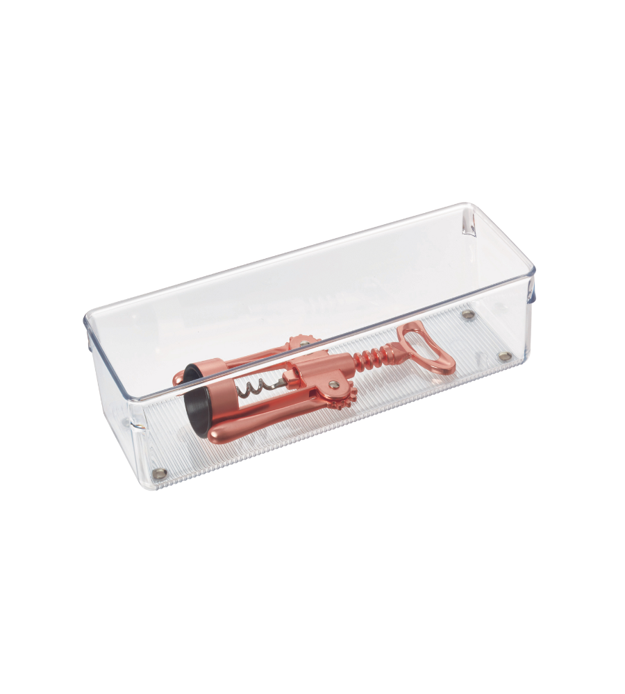A transparent, rectangular iDesign LINUS drawer organizer holds a winged corkscrew in rose gold metallic, presented on a textured white surface.