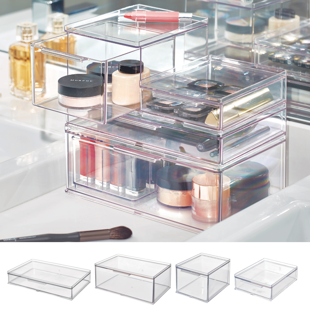 L'organizer modulare iDesign HOME EDIT con cassetto - varie dimensioni offre uno spazio trasparente dove mettere rossetti, cipria, pennelli e vasetti sul ripiano del bagno. Qui sotto ci sono quattro organizer modulari separati con cassetto.